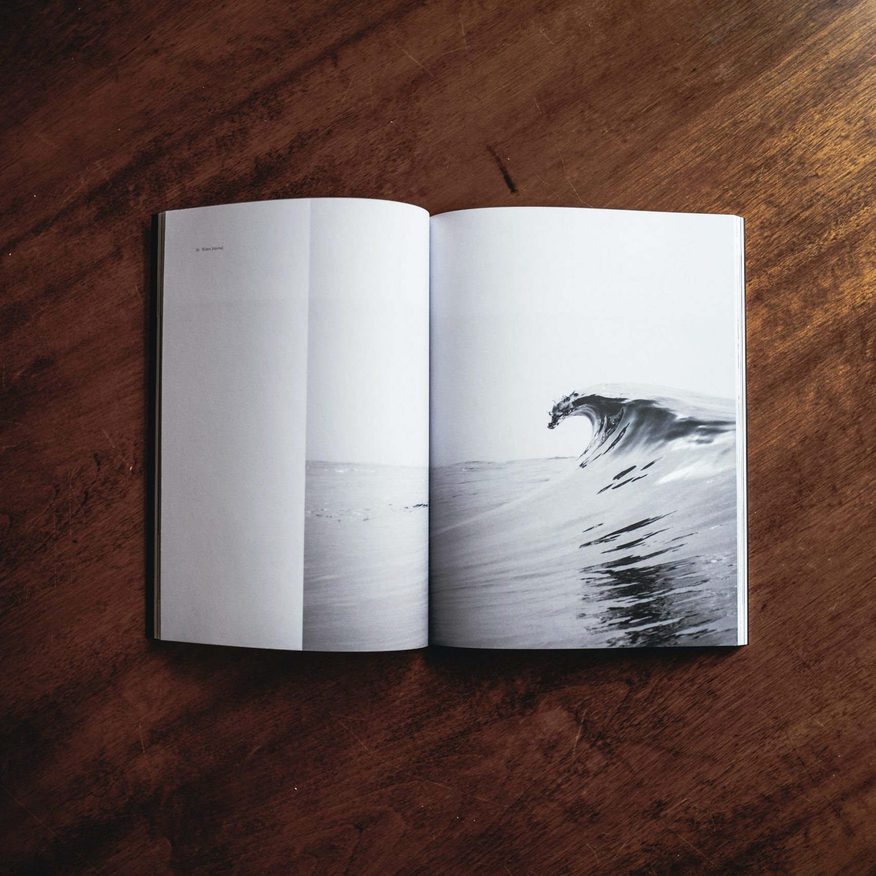 Andrew Neel - Unsplash - picture of wave in a book
